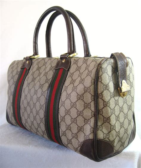 authentic gucci duffle bags.